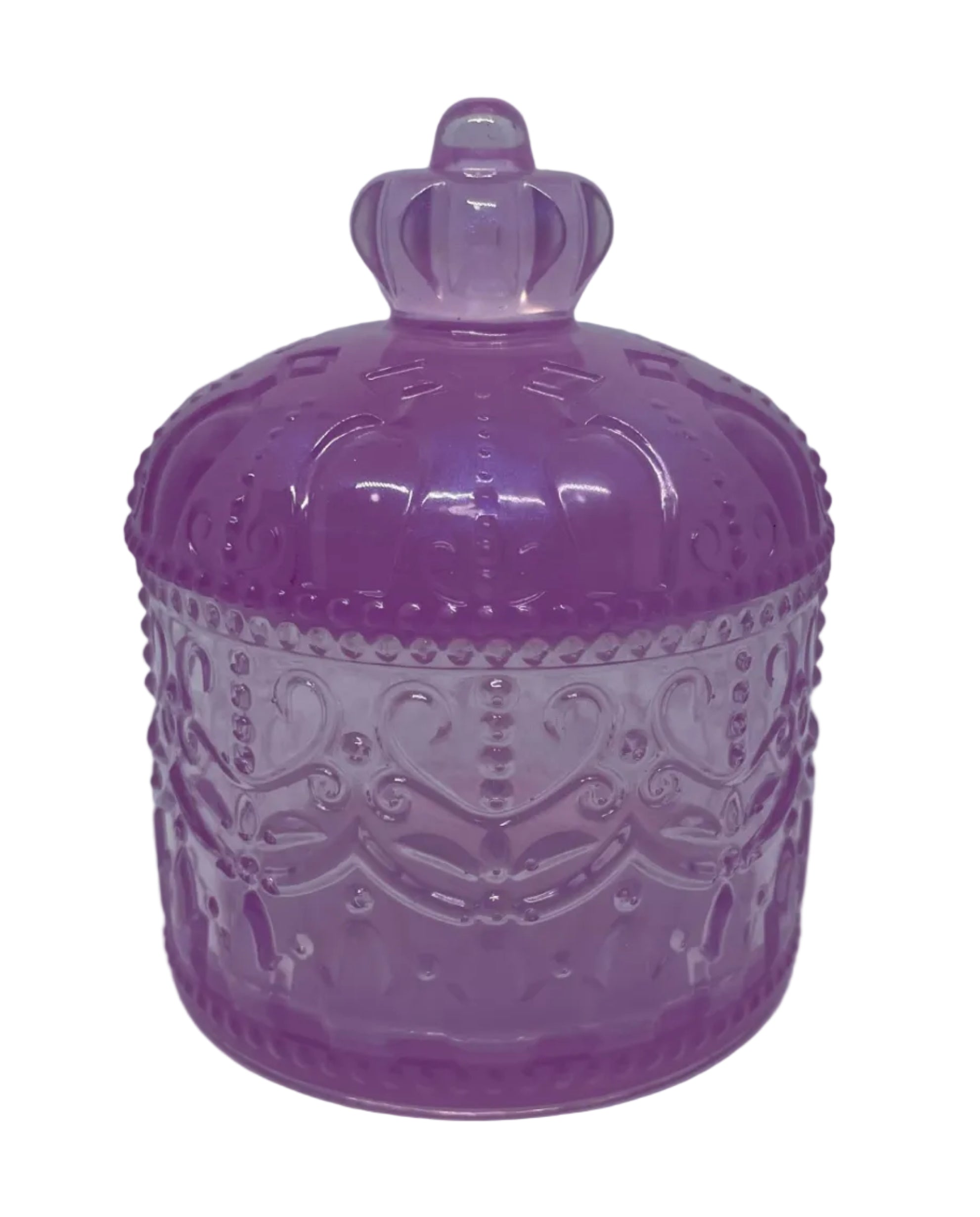 Purple glass trinket dish with intricate patterns on a white background