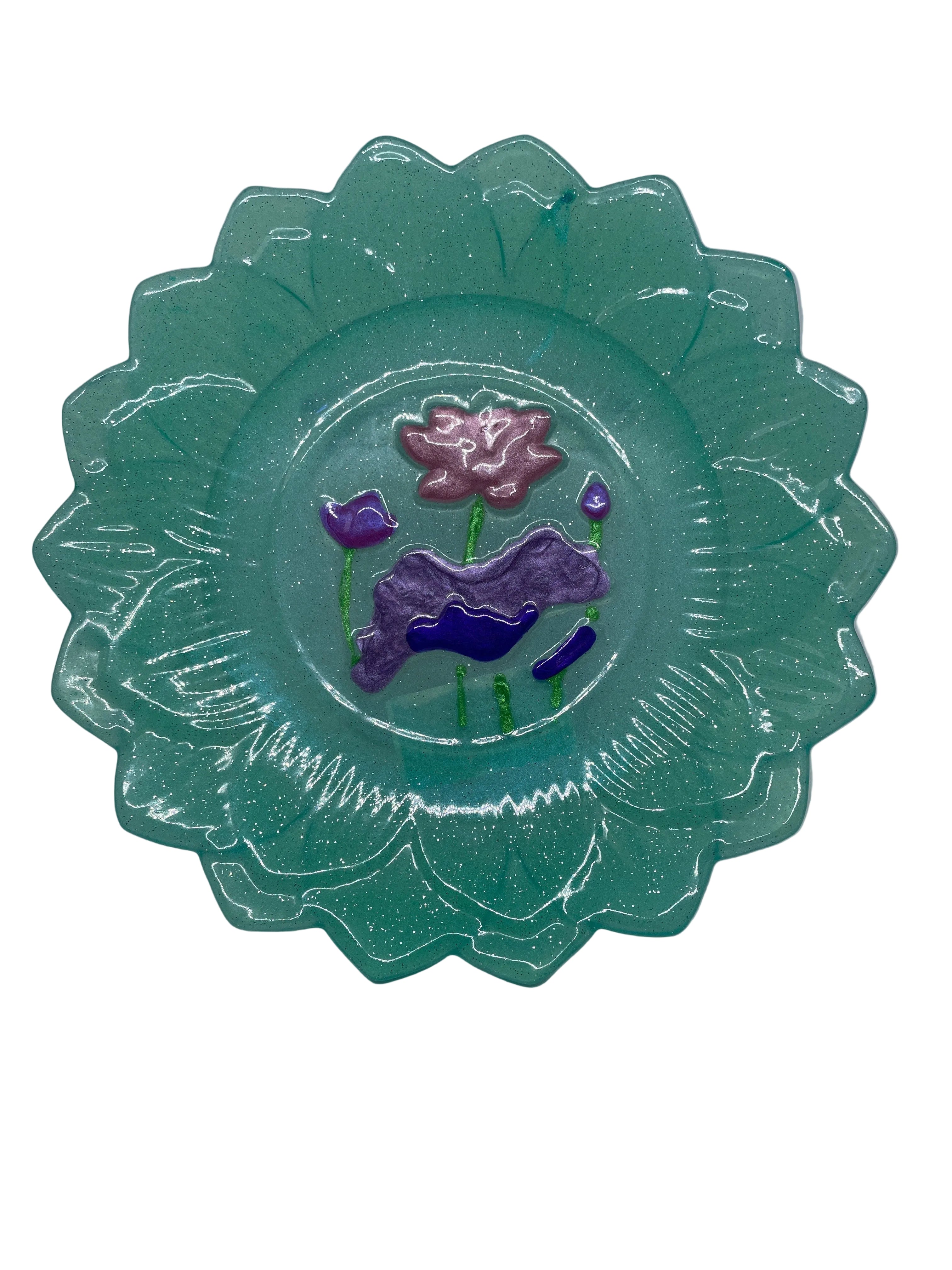 Decorative green Trinket Plate with floral design on a white background