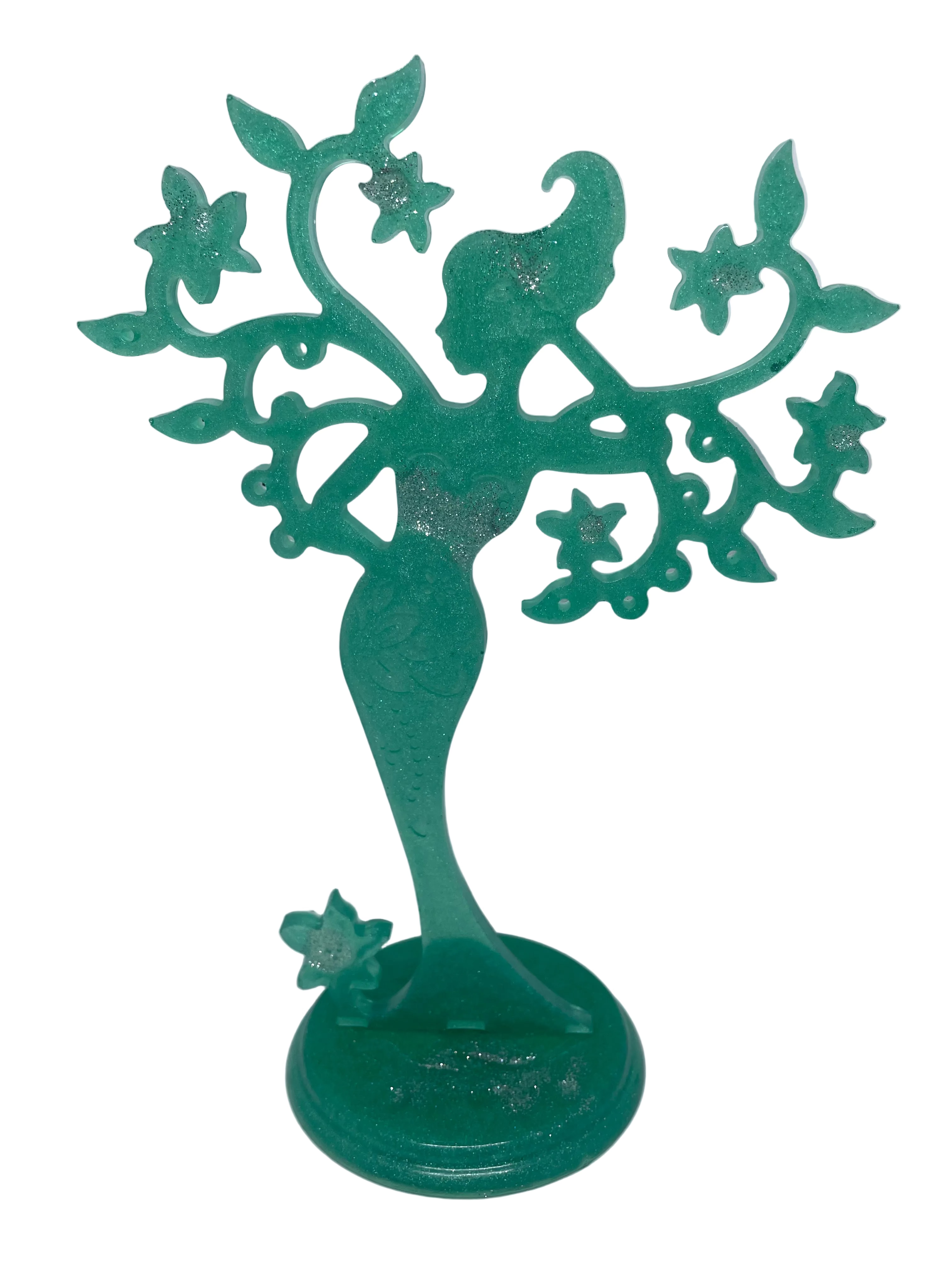 Green decorative figure with floral designs on a white background