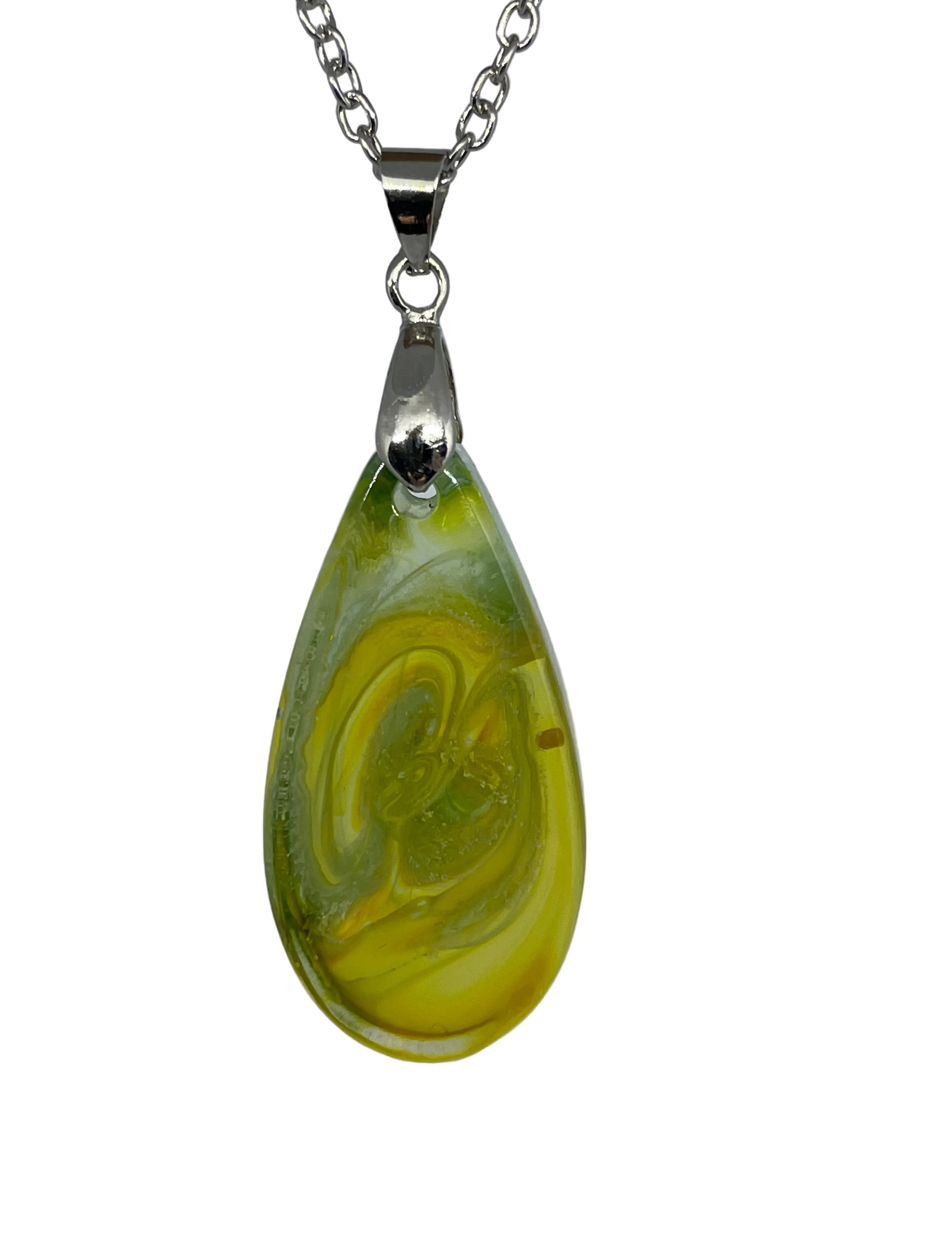 Teardrop-shaped green and yellow pendant on a silver chain against a gray background